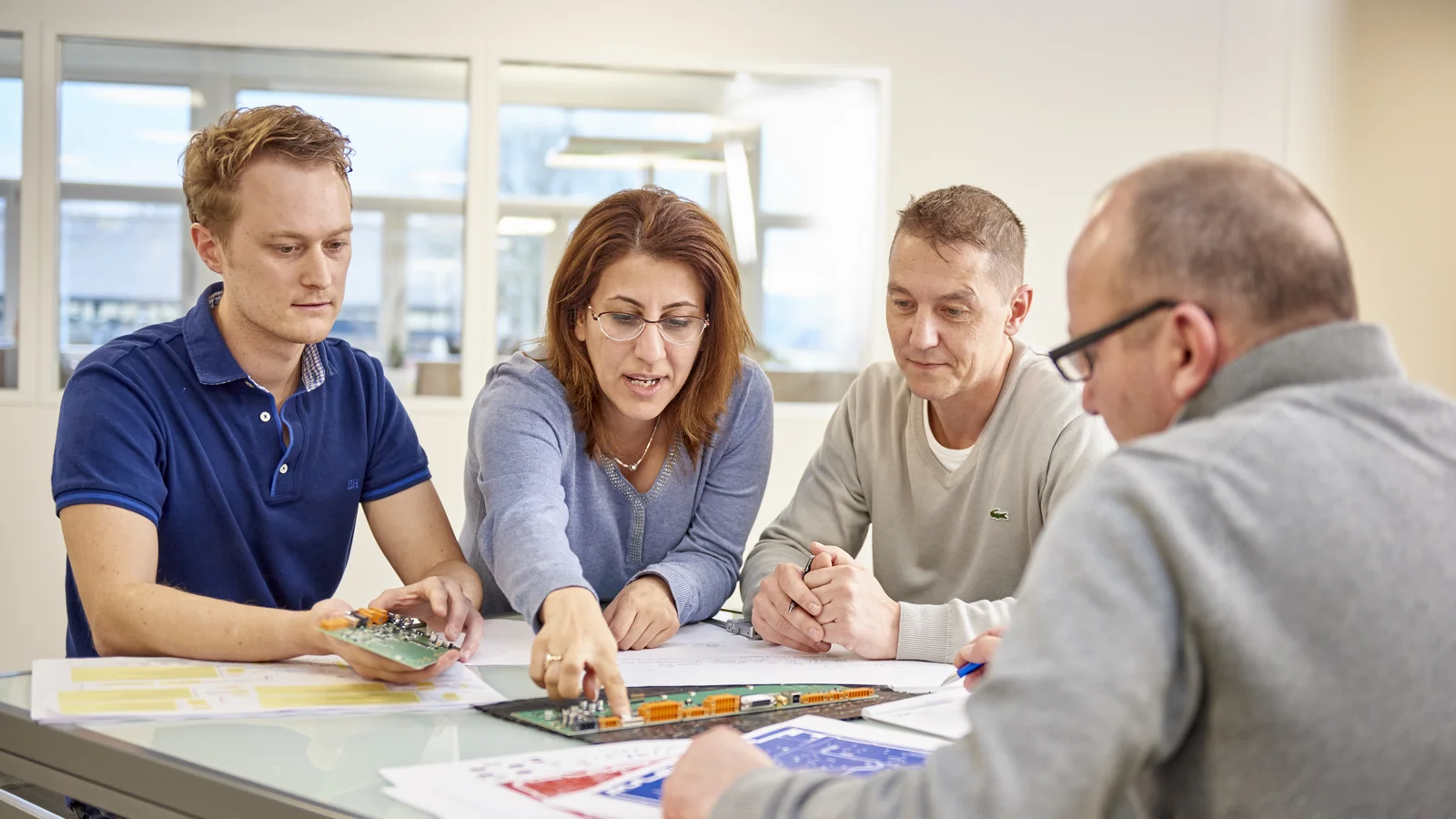Cicor engineering team discussing a project