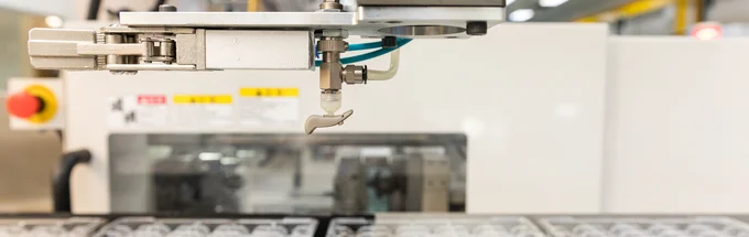 Plastic injection molding of a hearing aid component at the Cicor site in Batam