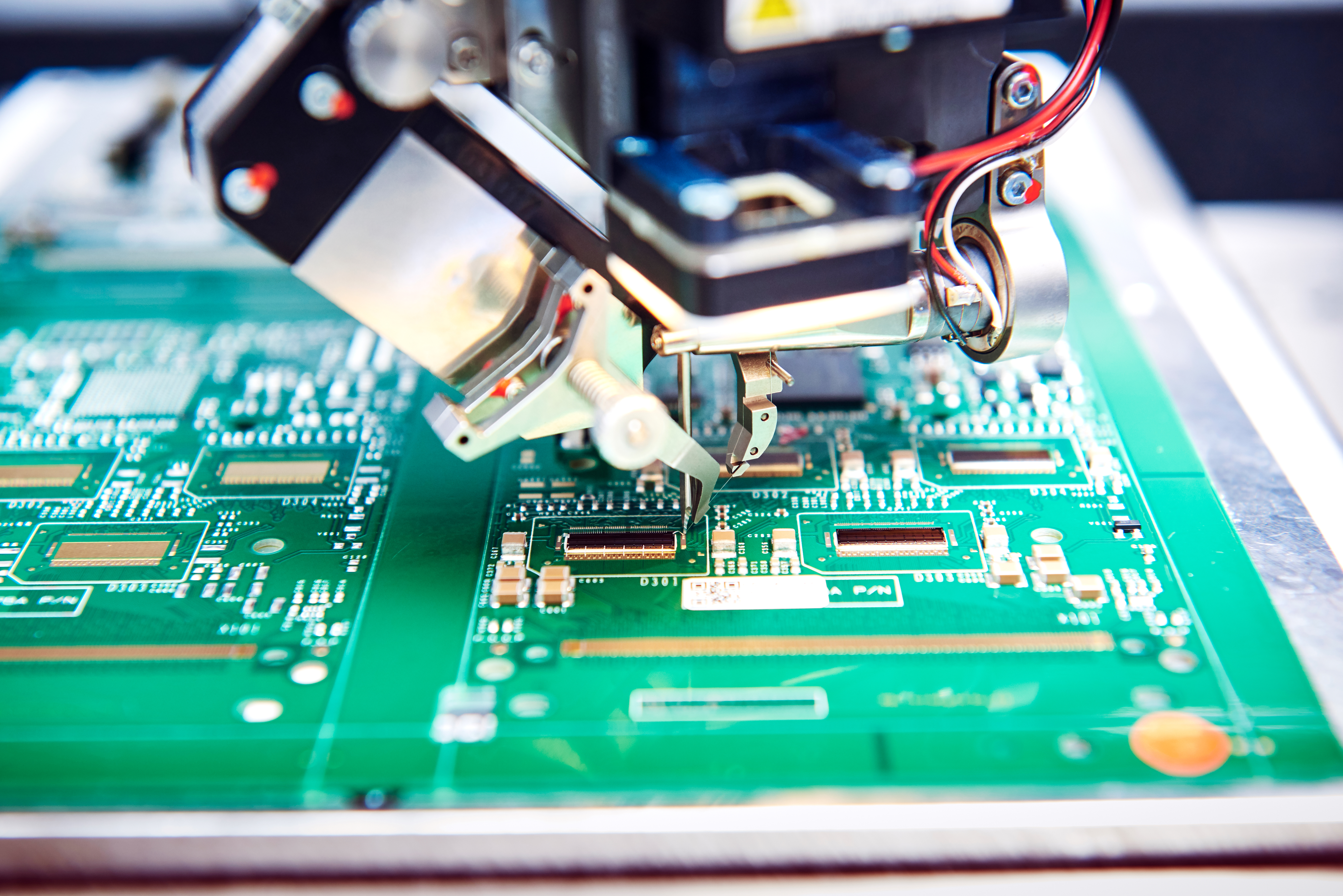 Close-up of wire bonding, part of Cicor's microelectronics assembly services
